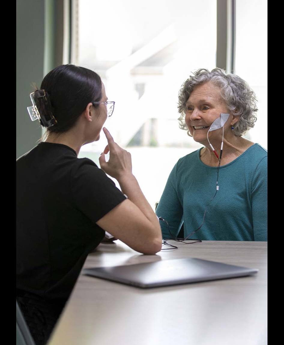Patient and an employee doing speech therapy